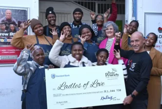 Pesto Princess and Ladles of Love team handing over a ceremonial cheque