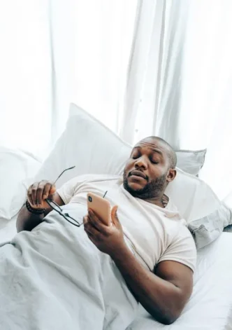 Person sleeping in bed