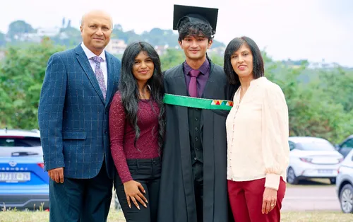 Jaedon Naidu with his parents and girlfriend